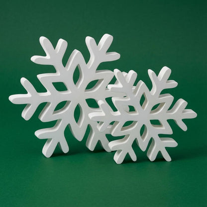 Two white snowflake shelf sitters on green background – Christmas tiered tray decor, made in USA