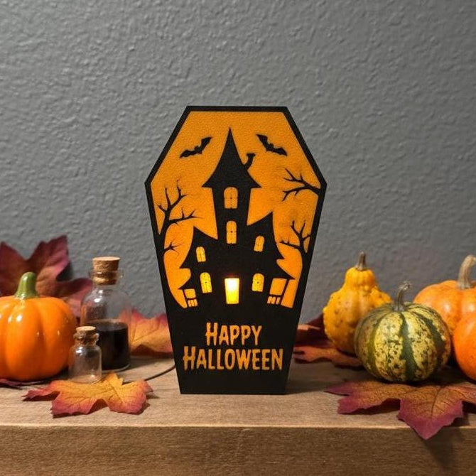 Gothic coffin candle holder with pumpkin design – spooky Halloween shelf decor, made in USA